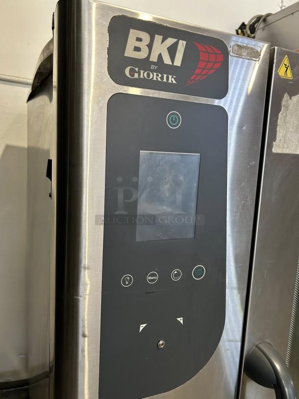 BKI Giorik ABTE101R electric combi oven, excellent condition, 208V 3PH, fully tested. Features control panel and logo.