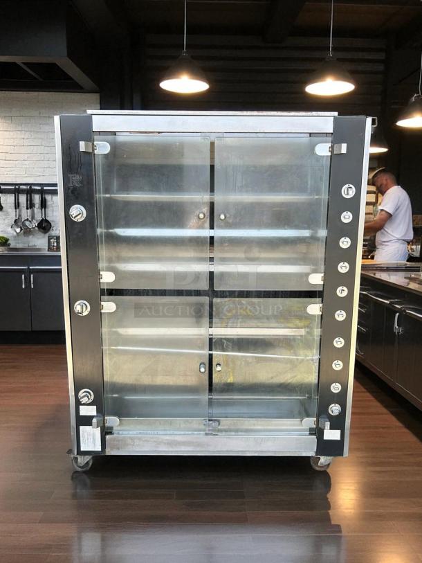 Rotisol USA FB1400-8G-SS gas rotisserie, 8 spit, 48 bird capacity, stainless steel, excellent condition, tested, natural gas.