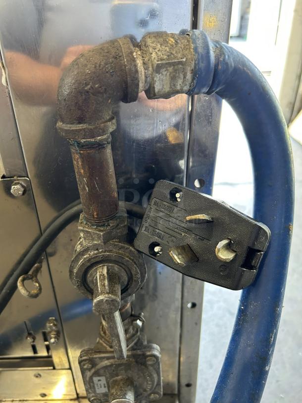 Rotisol FB1400-8G-SS commercial gas rotisserie connector, showing gas pipe, valve, and electrical plug.