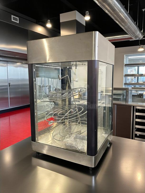 Star HFD-2A heated display cabinet with rotating racks, excellent condition, 120V, by Star Manufacturing, fully tested.