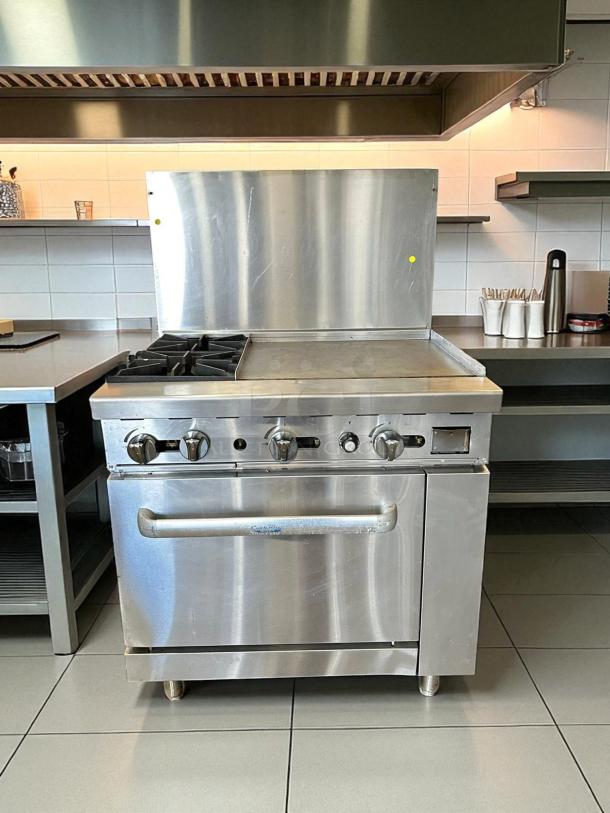 Atosa AGR-2B24GR gas range with 2 burners, 24" griddle, oven; stainless steel, like new, CookRite branding visible.