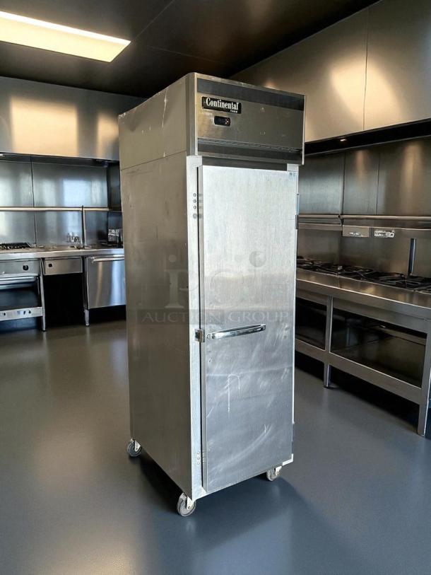 Continental 1FN 26" reach-in freezer, stainless steel, right-hinged solid door, on casters. Tested & working, 115V.