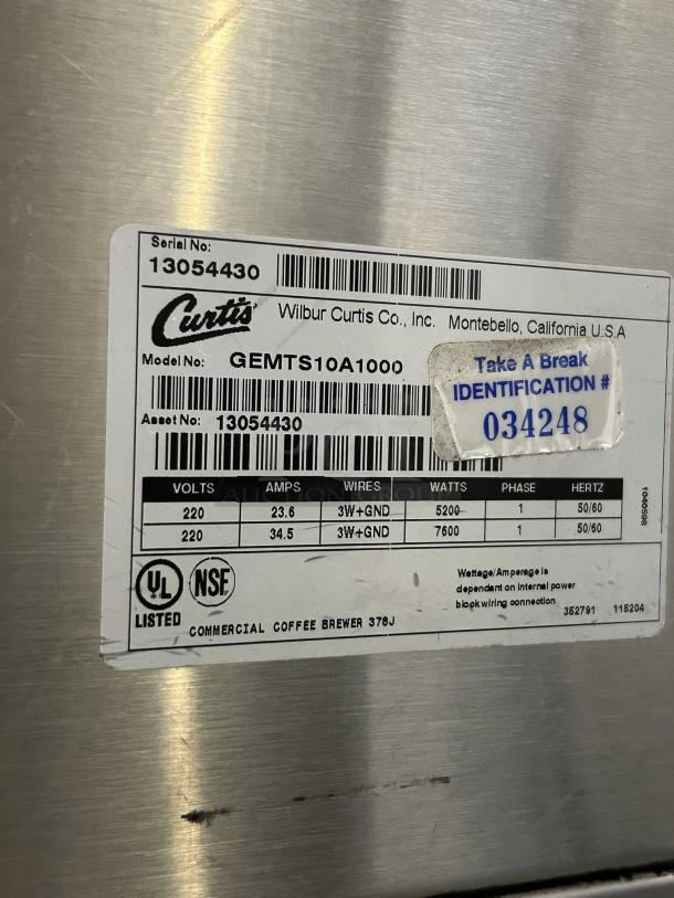 Curtis GEMTS10A1000 Automatic Twin Coffee Brewer label, showing model info, serial number, voltage specs, and certification marks.