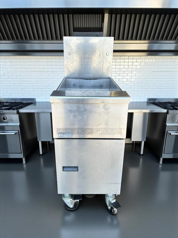 Pitco VF35 gas fryer in excellent condition, 70,000 BTU, fully tested, stainless steel with visible Pitco logo, on wheels.