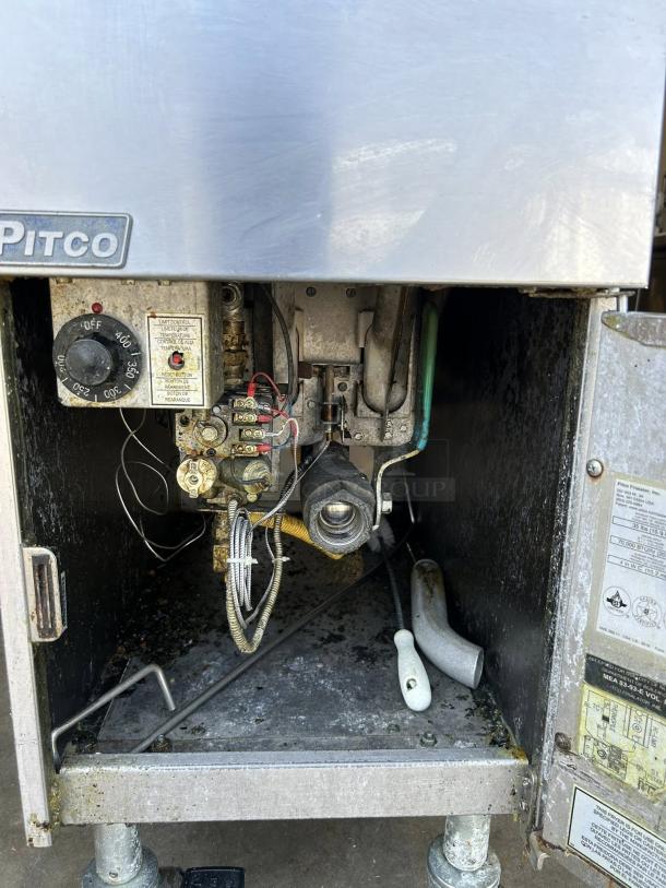 Pitco VF35 gas fryer in working condition, 70,000 BTU. Open view showing internal components, labels, and controls.