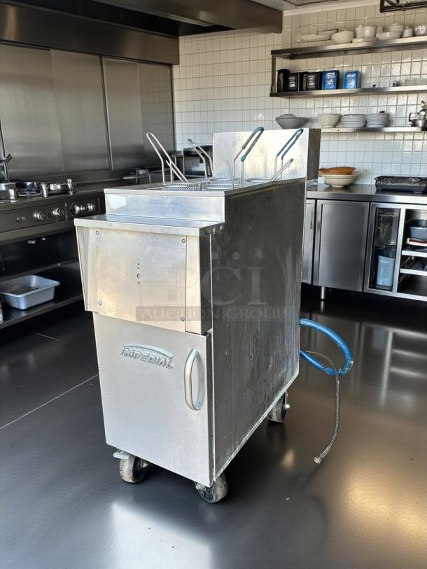 Imperial IPC-14 12 Gallon Stainless Gas Pasta Cooker in excellent condition, features dual baskets and mobility wheels.