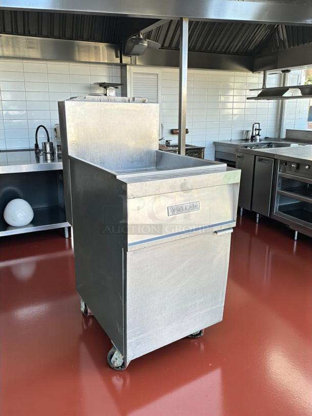 Vulcan LG400-1 45-50 lb. natural gas floor fryer, excellent condition, 120,000 BTU, fully tested and working, on wheels.
