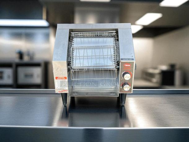 Hatco TRH-60 horizontal conveyor toaster, superb condition, 300 slices/hr, 208V, fully tested, with dials and labels visible.