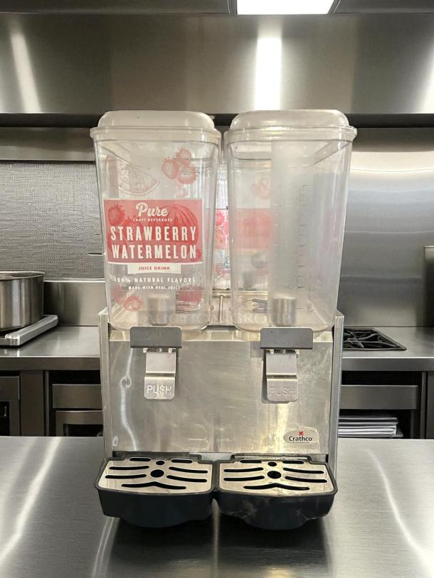 Crathco D25-3 dual bowl cold beverage dispenser, excellent condition, 115V, stainless steel, fully tested, visible branding.
