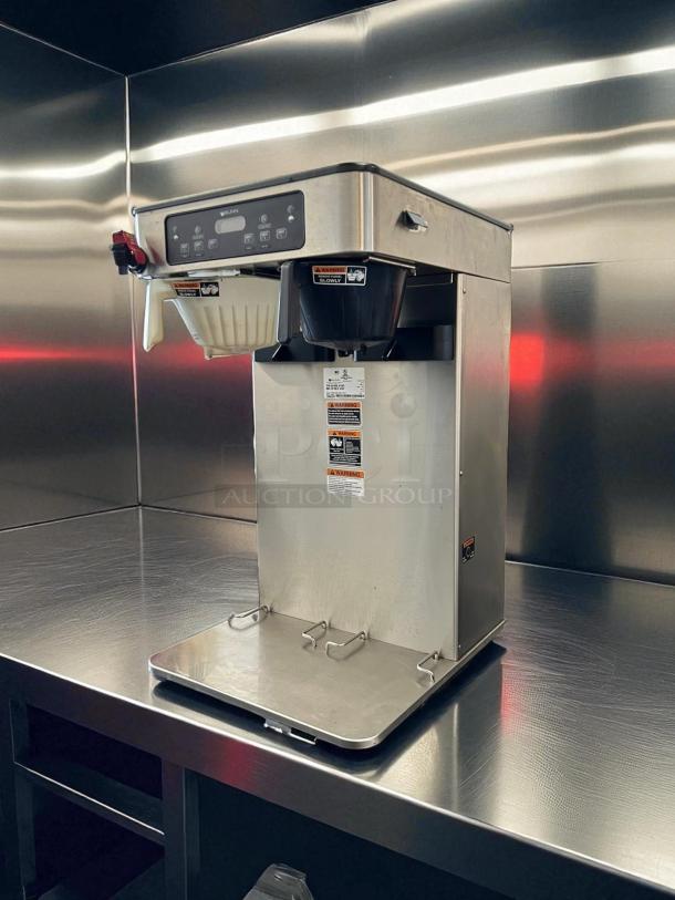 Bunn ITCB Infusion Series Twin Brewer in excellent condition, 120/240V, fully tested, stainless steel, visible warning labels.