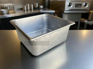 Heavy duty 1/2 size 6” deep stainless steel hotel pan, high-quality gauge, polished finish, excellent condition.