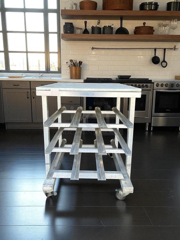 NEW AGE Half Size Mobile Aluminum Can Rack with PolyTop Cutting Board, excellent condition, for #10 and #5 cans.