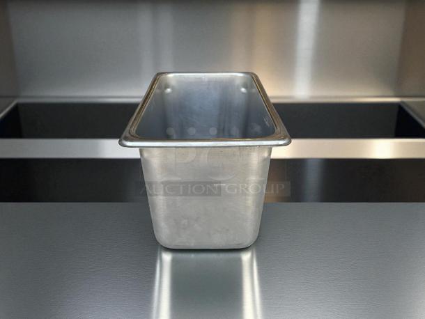 1/4 Size 6” Deep Stainless Steel Hotel Pan, excellent condition, ideal for catering and food service.