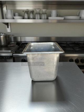 1/6 size 6" deep stainless steel hotel pan in great condition, ideal for professional kitchens.