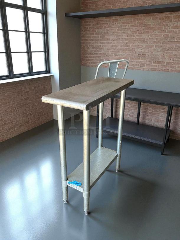 GSW stainless steel worktable in amazing condition, featuring sturdy construction with a lower shelf and polished surface. Ideal for commercial use.