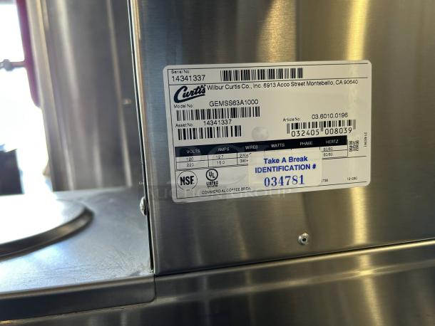 Curtis GEMSS63A1000 G3 Gemini 1.5 Gallon Coffee Brewer in perfect condition, labels showing model, serial, and asset numbers.