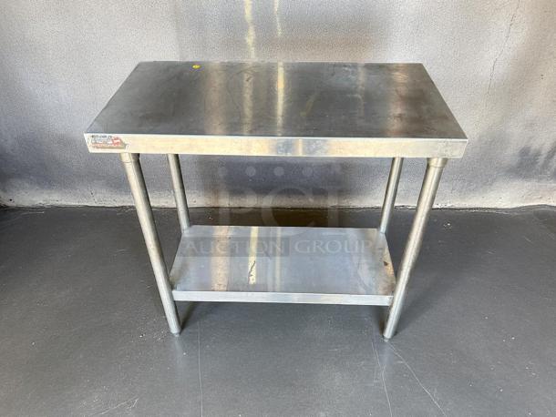 GSW all stainless steel worktable in great condition, with lower shelf. Features sturdy construction and clean surface.