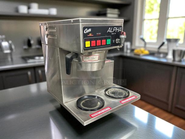 Curtis ALPHA 3DR 12-cup coffee brewer, excellent condition, with 3 right-side warmers. Fully tested, 120V. Model tag visible.
