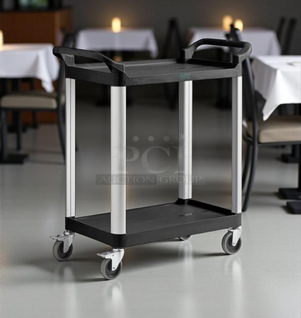 Brand new Choice black utility cart with two shelves, 31" x 19", in factory box. Durable wheels and sturdy handles included.