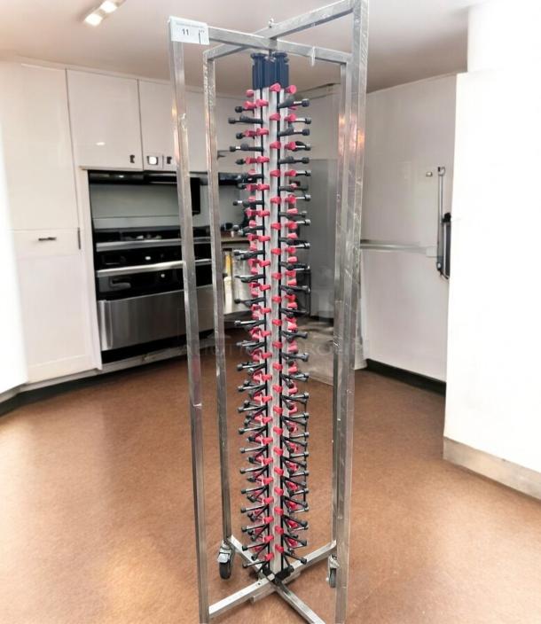 Stainless steel skewer/kebab rack stand in excellent condition, features vertical holders, custom commercial model, mobile wheels.