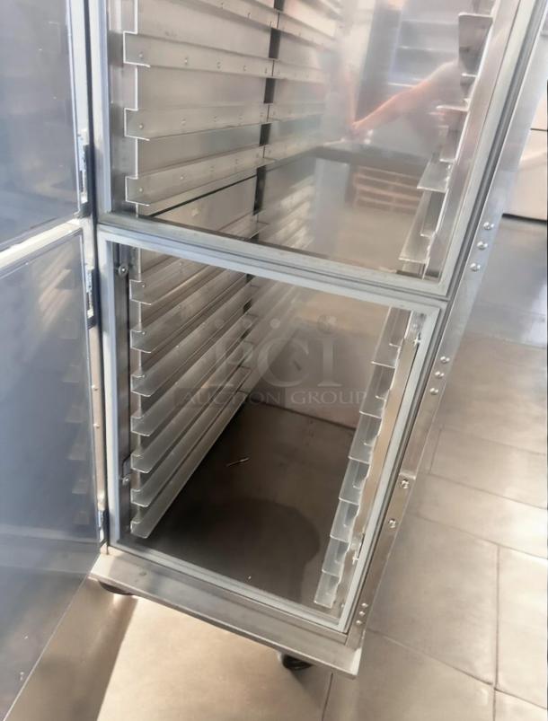 Henny Penny HC-900 Heated Holding Cabinet in great condition, features multiple shelves, 120V, stainless steel, tested working.