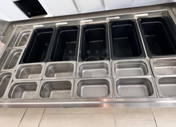 Everest EPBR2 48" sandwich/salad prep table in great condition, features multiple compartments, tested and working.