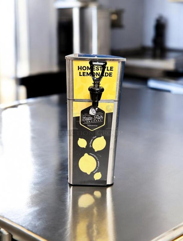 Newco FPM-1 Homestyle Lemonade Dispenser in stainless steel, excellent condition, State Fair branding, tested and working.