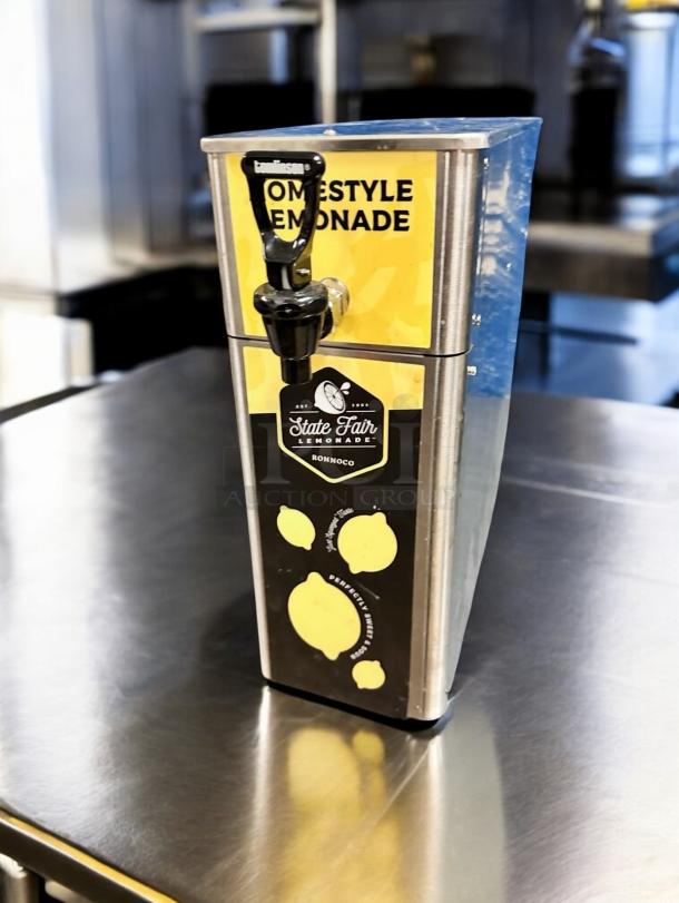 Newco FPM-1 State Fair Lemonade Dispenser, stainless steel, excellent condition, tested, with labels and lemon graphics.