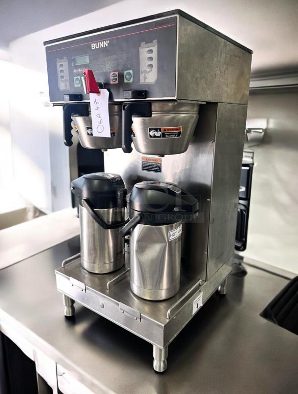 Bunn Dual BrewWISE DBC commercial coffee brewer, excellent condition, 120/240V, tested and working, dual dispensers, stainless steel.