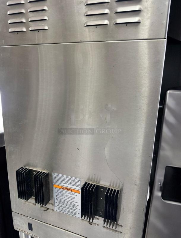 Bunn Dual BrewWISE DBC Coffee Brewer in excellent condition, stainless steel finish, 120/240V. Tested and working.