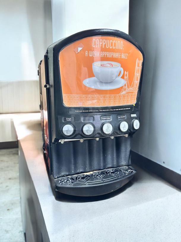 Grindmaster PIC5 4-flavor cappuccino dispenser, excellent condition, 120V, fully tested, visually clean with functional buttons.