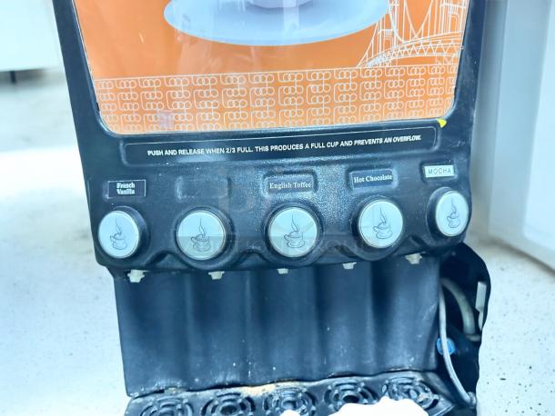 Grindmaster PIC5 4-flavor dispenser in excellent condition, offers French Vanilla, English Toffee, Hot Chocolate, Mocha. 120V, tested.