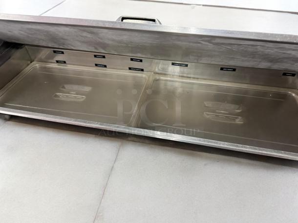 Turbo Air TST-48SD salad/sandwich prep table with refrigerated base, great condition, visible food labeling.