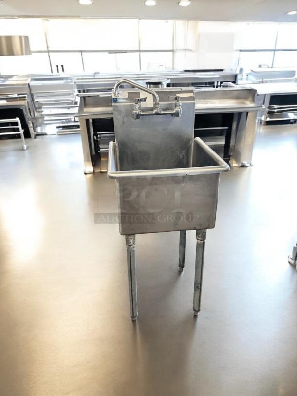 Heavy-duty stainless steel utility sink, single compartment, excellent condition, fully tested, commercial grade.