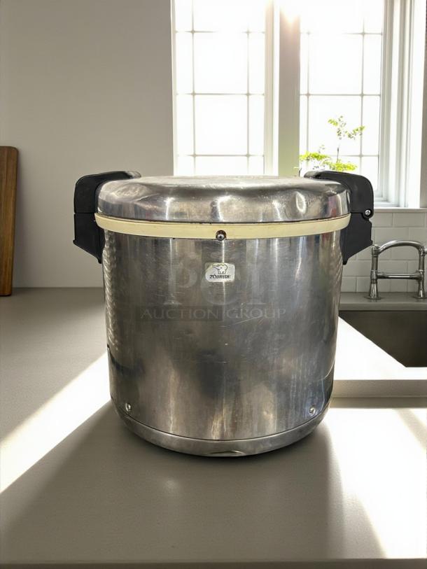 Zojirushi 8-Liter Electric Rice Warmer in stainless steel, great condition, 115V, tested and working.