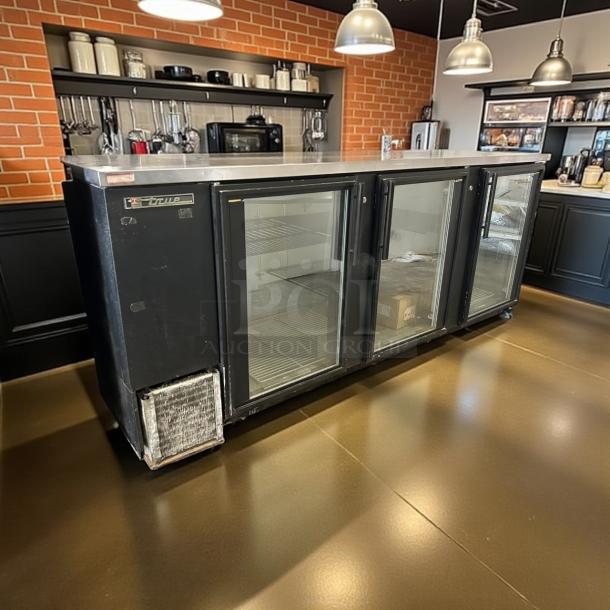 True TBB-4G black glass door back bar refrigerator, 90 3/8", excellent condition, LED lighting, fully tested and working.