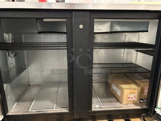 True TBB-4G Black Glass Door Bar Refrigerator, 90 3/8", LED lighting, excellent condition, interior shelves, fully tested.
