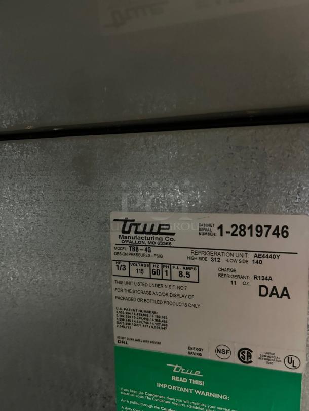 True TBB-4G Back Bar Refrigerator, model label visible, voltage 115, tested and working, NSF certified, R134A refrigerant.
