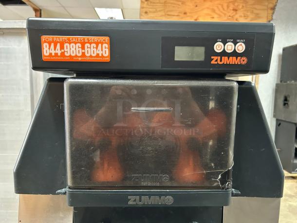 Zummo Z40-N Centrifugal Citrus Juicer, excellent condition, processes 40 fruits/min, 290W, 120v, fully tested, visible service sticker.