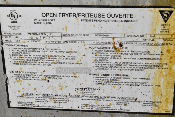 Henny Penny EEG-243 FFFX ST fryer label showing model, natural gas type, 225,000 BTU, and operating instructions.