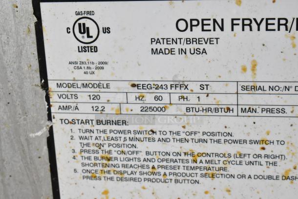 Henny Penny EEG-243 FFFX ST commercial gas fryer label detailing model, 120V, 12.2A, 225,000 BTU, made in USA.