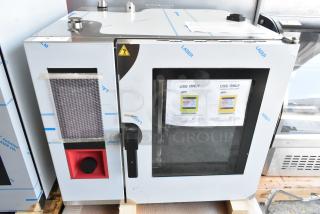 Brand new Blodgett ABTG061R stainless steel commercial combi convection oven, natural gas, with minor scratches.