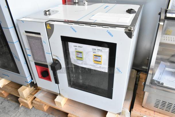 Brand new Blodgett ABTG061R stainless steel commercial gas combi convection oven, scratch and dent condition.