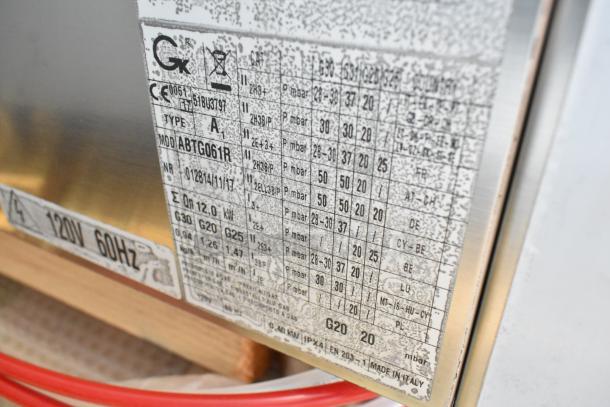 Stainless steel plate with specifications for Blodgett ABTG061R oven, showing natural gas settings and energy ratings.