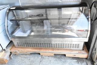 Brand new Vollrath RDE7160 40" curved glass refrigerated display case. Scratch and dent, 120 volts, 1 phase, in original packaging.