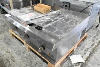 Brand new Cooking Performance Group 351GTCPG36NL 36" gas griddle, stainless steel, flame failure protection, 90,000 BTU.