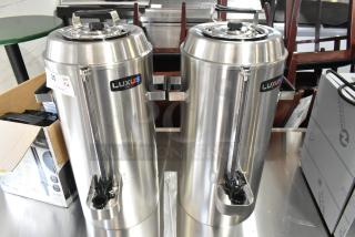 2 BRAND NEW SCRATCH AND DENT! Fetco TPD-30 Luxus Stainless Steel 3 Gallon Coffee Dispenser. 2 Times Your Bid! - Item #1203298