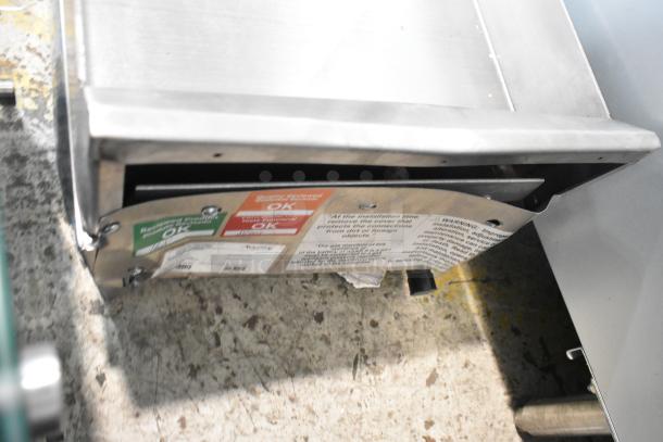 BRAND NEW Avantco 177CAG15MG 15" Stainless Steel Gas Griddle, 30,000 BTU. Scratch and dent, manual controls visible.