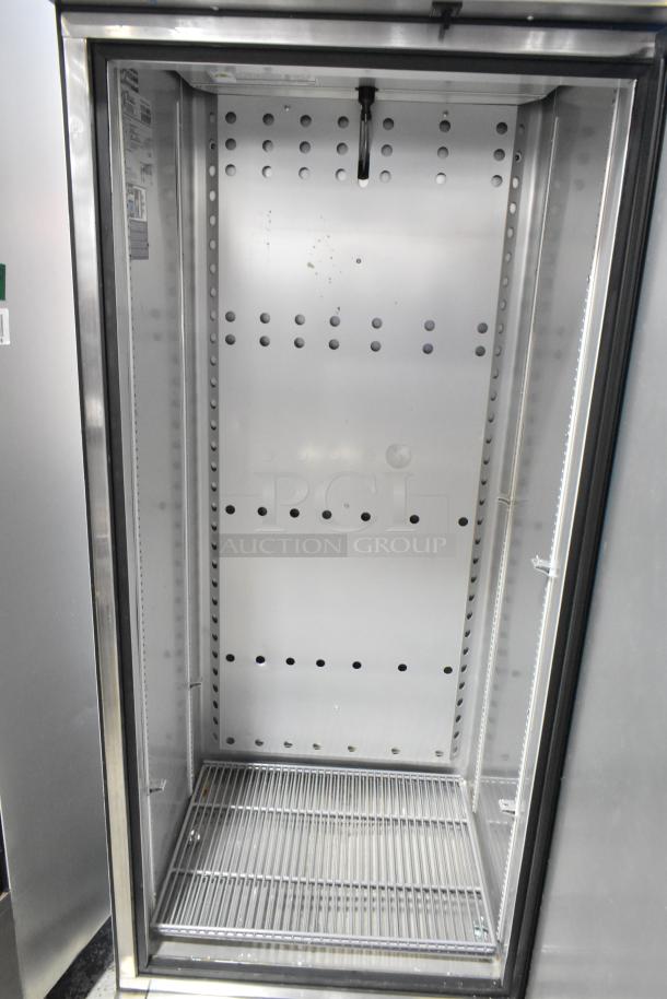 2022 True T-19F-HC stainless steel commercial freezer, single door, poly-coated racks, on commercial casters.
