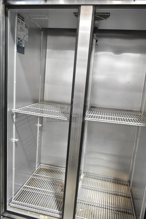 2020 True T-35-HC stainless steel 2-door reach-in cooler, poly coated racks, commercial casters, 115V, 1 phase.